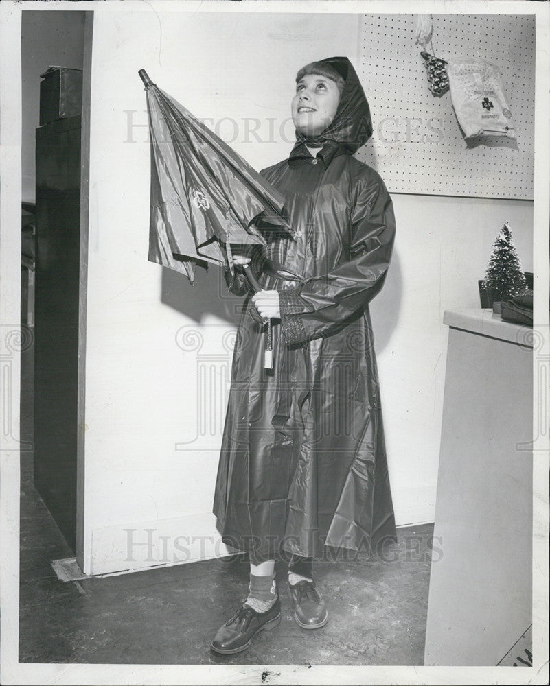 1956 Press Photo Girl Scout Equipment Rain Coat Judy Capini - Historic Images