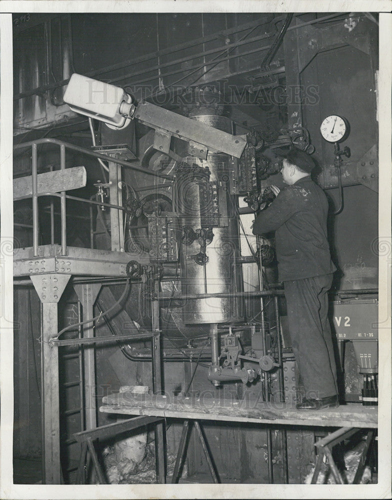 1953 Press Photo Worker Checks Camera In New German Plant - Historic Images