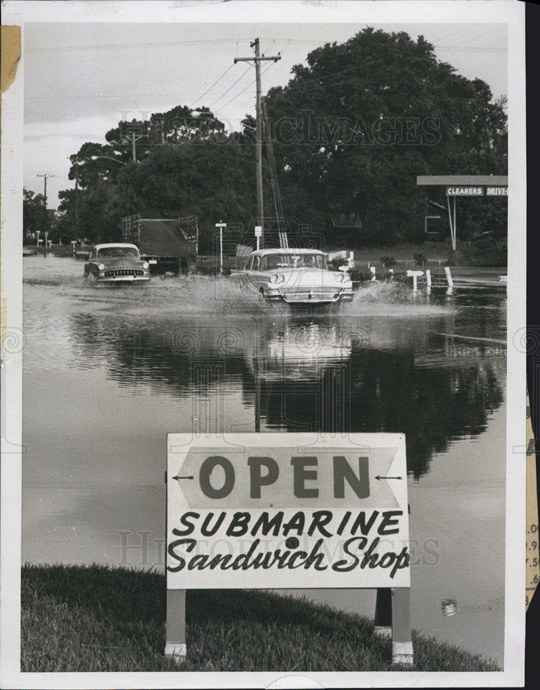 1959 Press Photo A restaurant sign to match the flooded streets - Historic Images