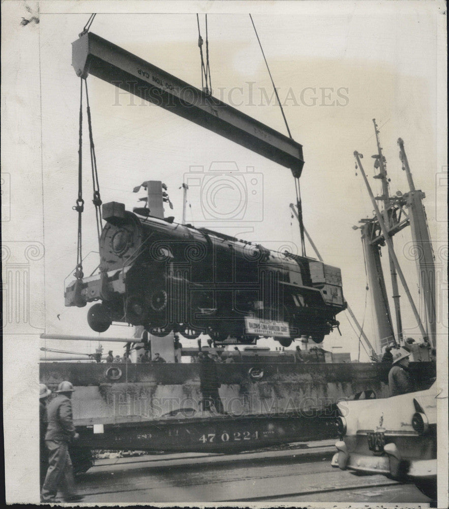 1956 Press Photo One of six India bound locomotives aboard Navy ship. - Historic Images