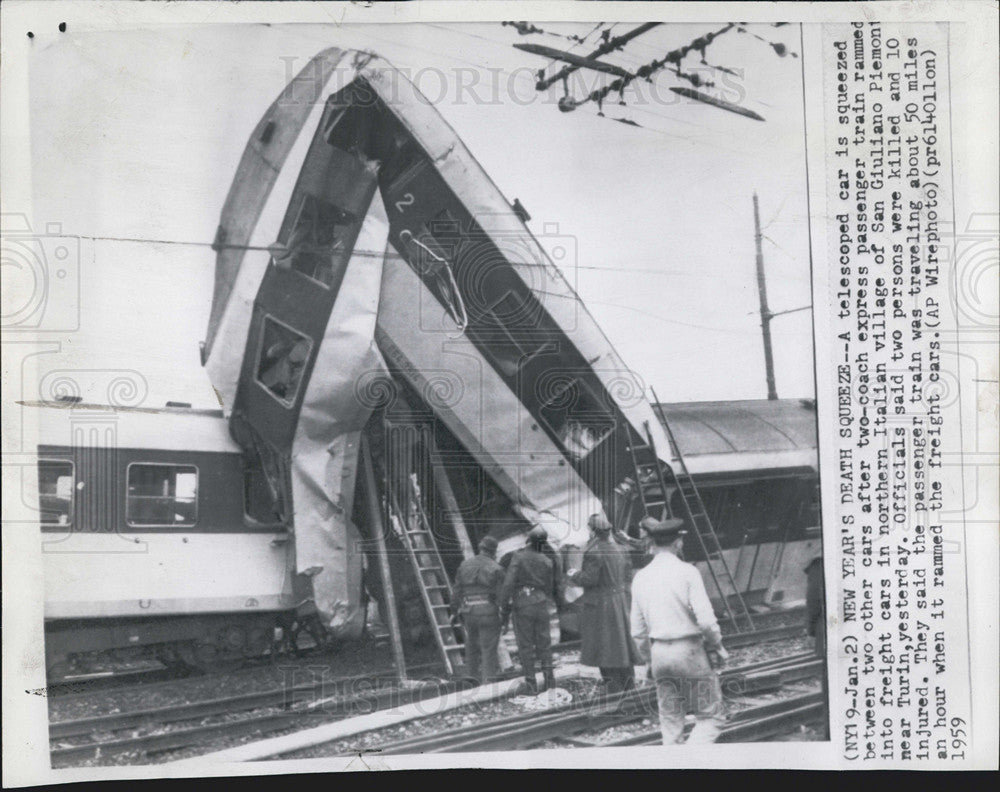 1959 Press Photo Train Car Crushed Between Two Others In San Guiliano 2 Dead - Historic Images