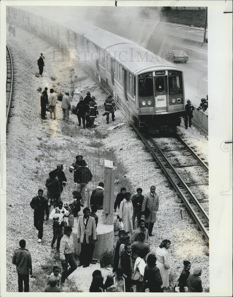 1984 Press Photo Firemen put out fire on CTA train - Historic Images