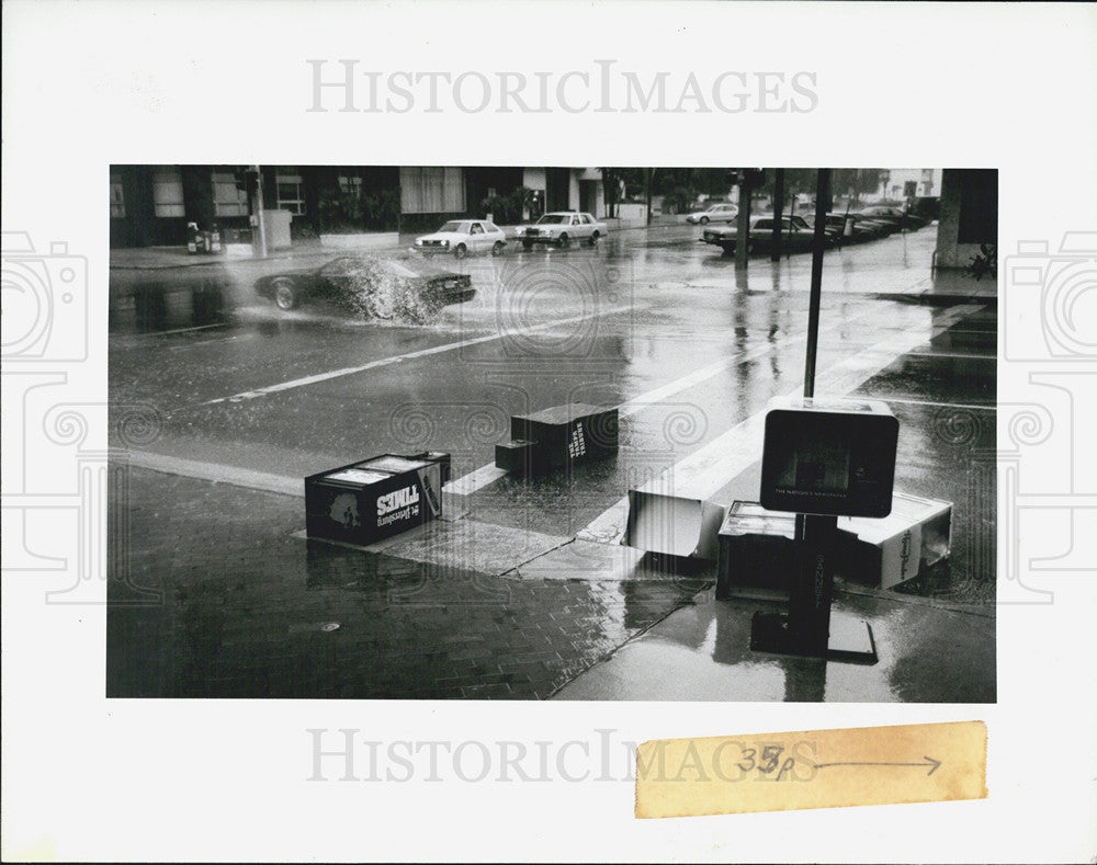 1991 Press Photo Newspaper racks tossed from a storm hitting downtown Petersburg - Historic Images