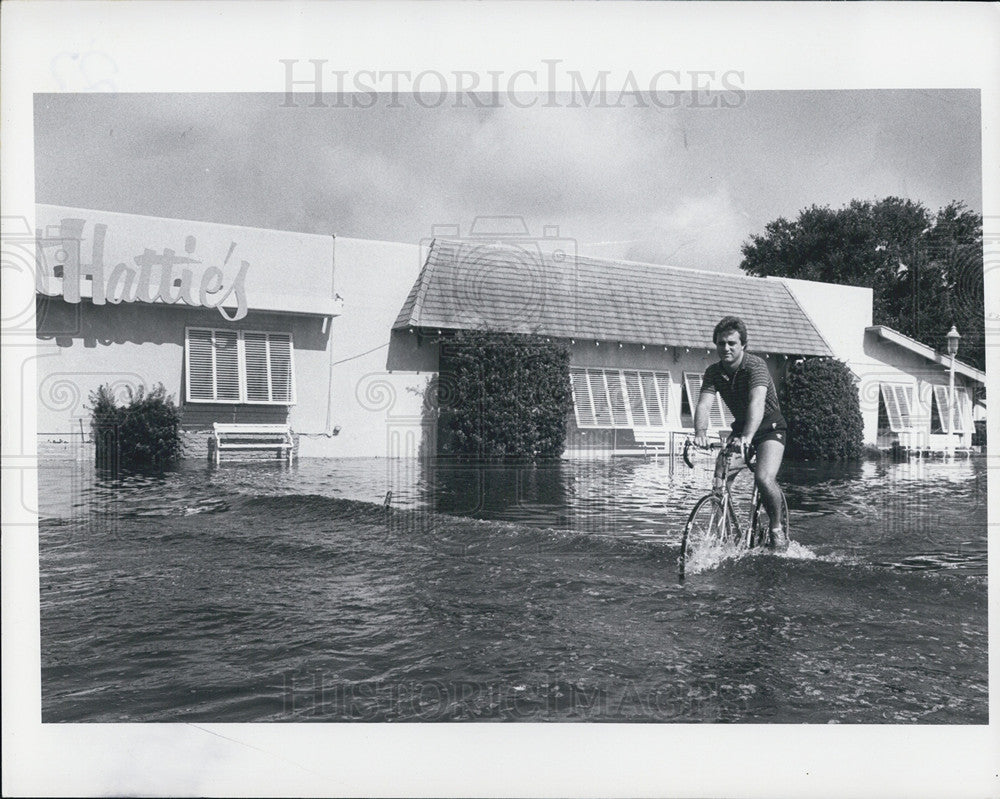 Press Photo man rides bike water St. Petersburg - Historic Images