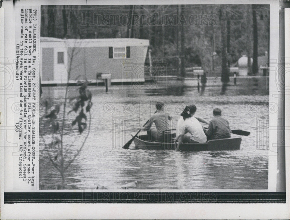 1969 Press Photo Four boys go boating to their trailer court after 12-in rain - Historic Images