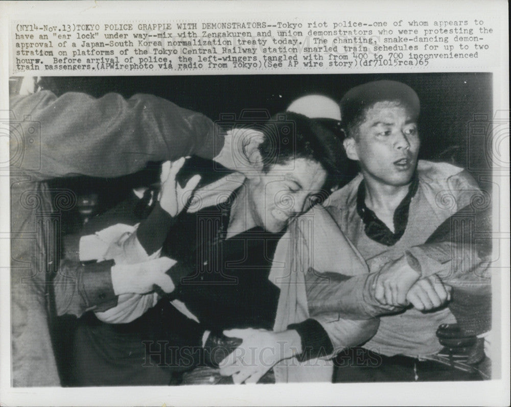 1965 Press Photo Japan anti riot police breaks up protesters against Japan Korea - Historic Images