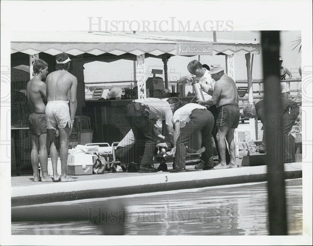 1987 Press Photo Young Boy is Revived at Near Drwoning at Bath Club - Historic Images