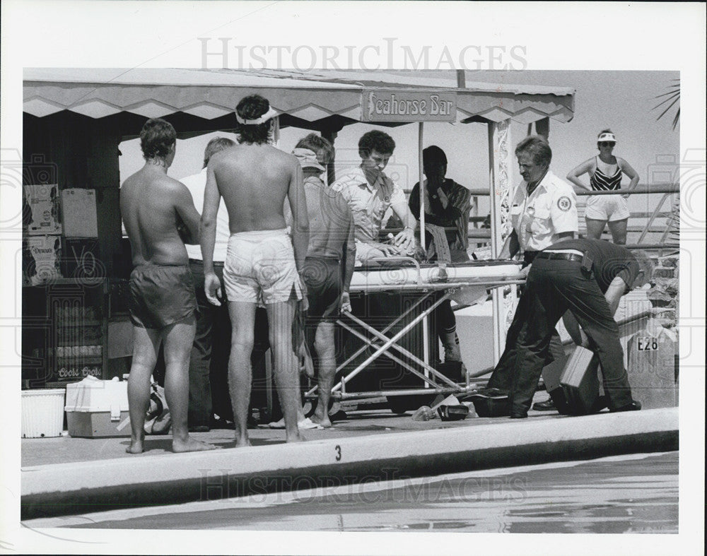 1987 Press Photo Young Boy Revived After Nearly Drowning at Bath Club - Historic Images