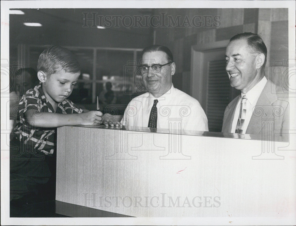 1970 Press Photo 5 Yr Old Writes 1st Bank Book As His Father Did - Historic Images