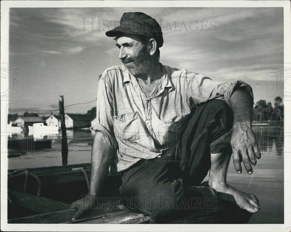 Press Photo Photo of a man on a boat - Historic Images