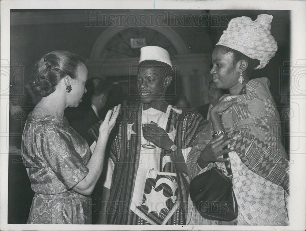 1963 Press Photo Mrs. Dean Rusk chats with Oumar Sow Mali Ambassador &amp; his wife - Historic Images