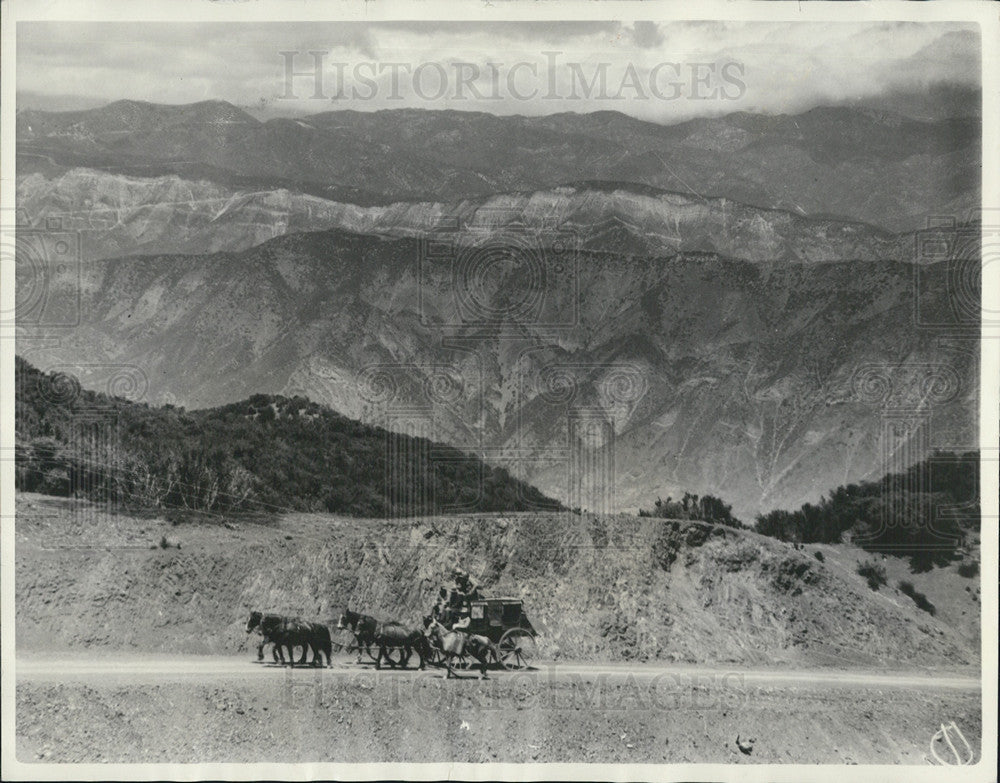 1935 Press Photo Stage Coach Riding In Wilderness - Historic Images