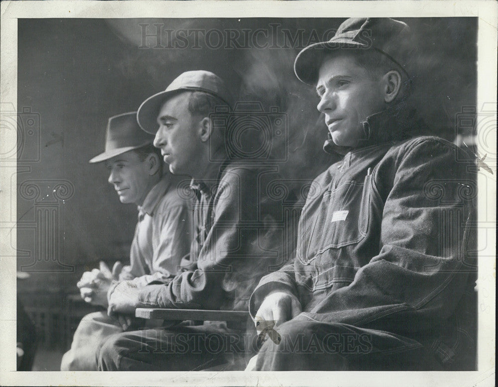 1943 Press Photo Farmers Reflect On Their Work - Historic Images