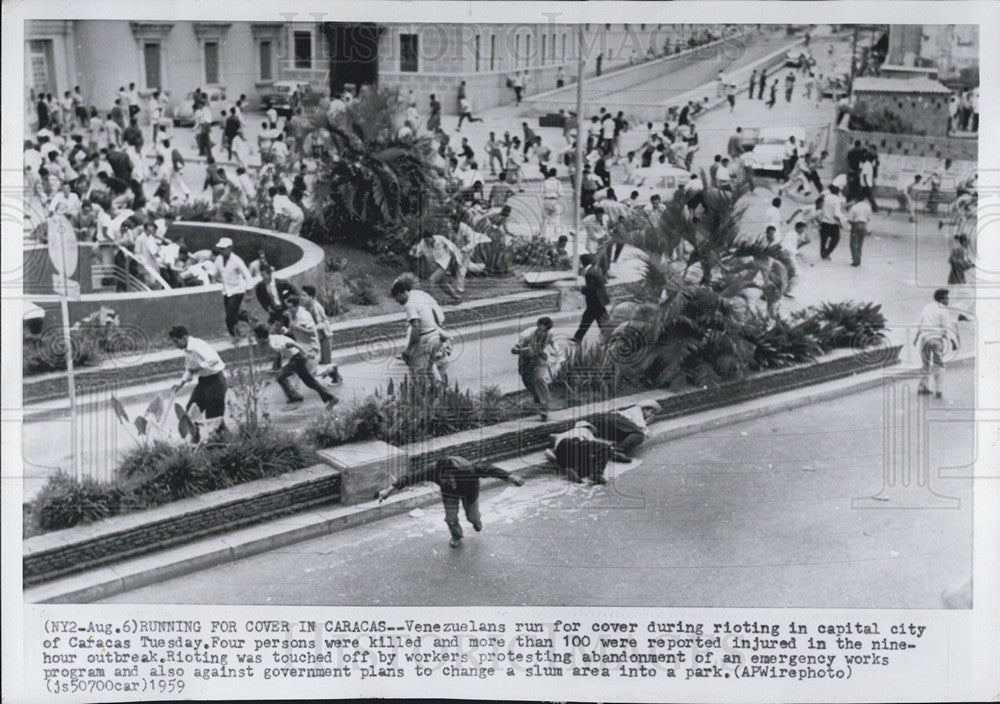 1963 Press Photo Venezuelans run for cover during riot - Historic Images