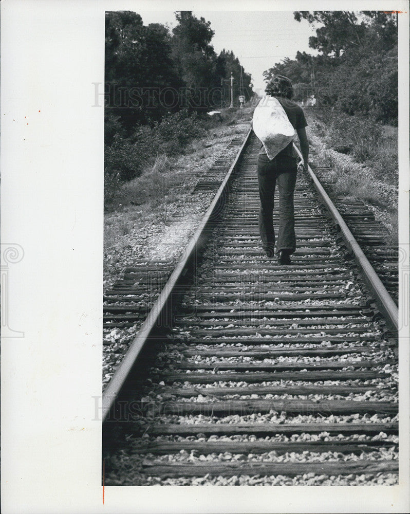 1976 Press Photo Brad Sarachmen, Train Tracks - Historic Images