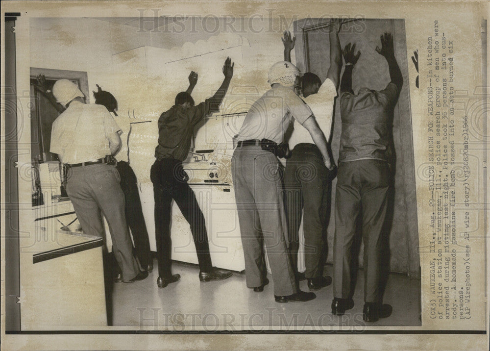 1966 Press Photo Police Search Rioters For Weapons In Illinois - Historic Images