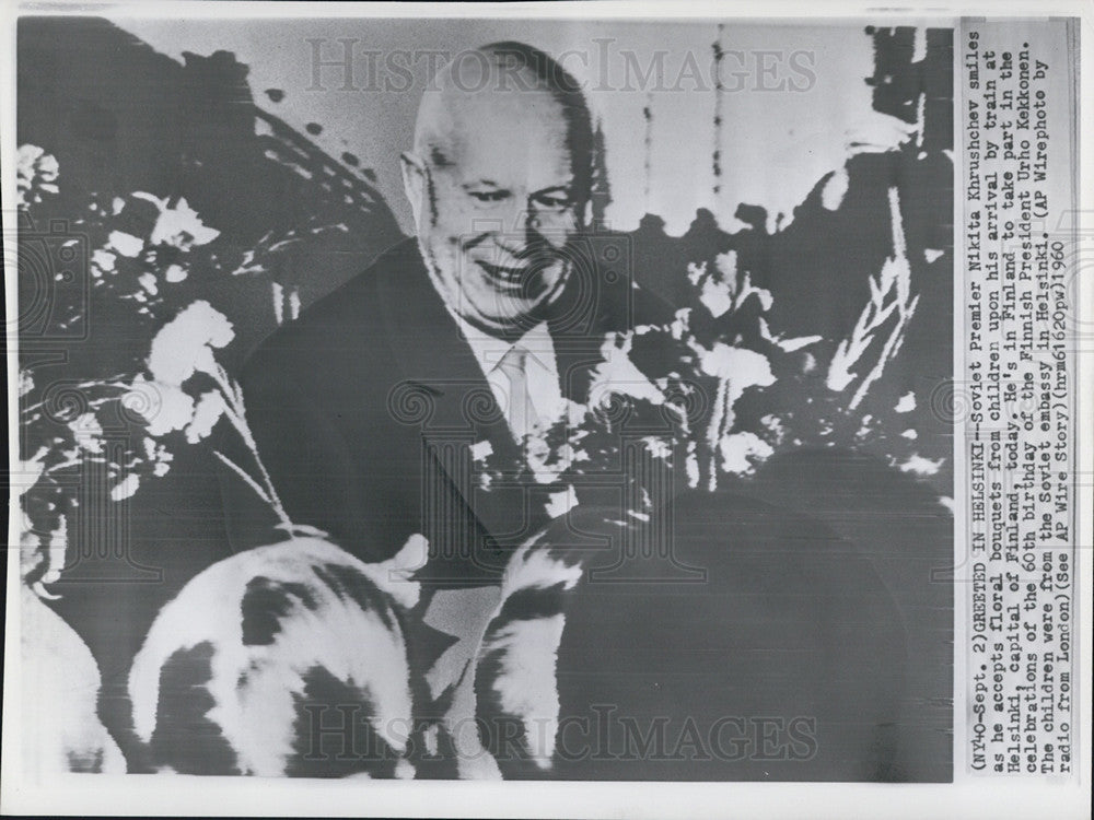 1960 Press Photo Soviet Premier Nikita Khrushchev accepts Floral bouquets. - Historic Images