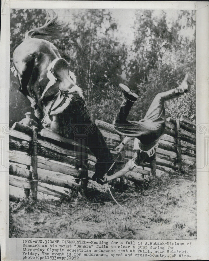 1952 Press Photo A, Rubaek-Nielson falls as his horse fails to clear a jump. - Historic Images