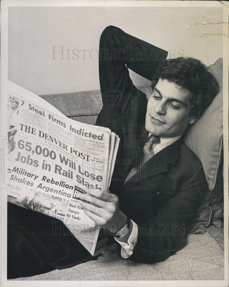 1963 Press Photo Actor Omar Sharif Reads The Denver Post Newspaper - Historic Images