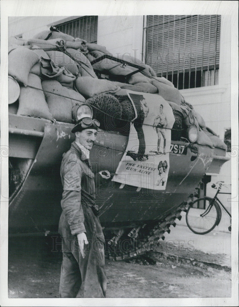 1956 Press Photo British  Soldier  with his armored vehicle with advertisement. - Historic Images