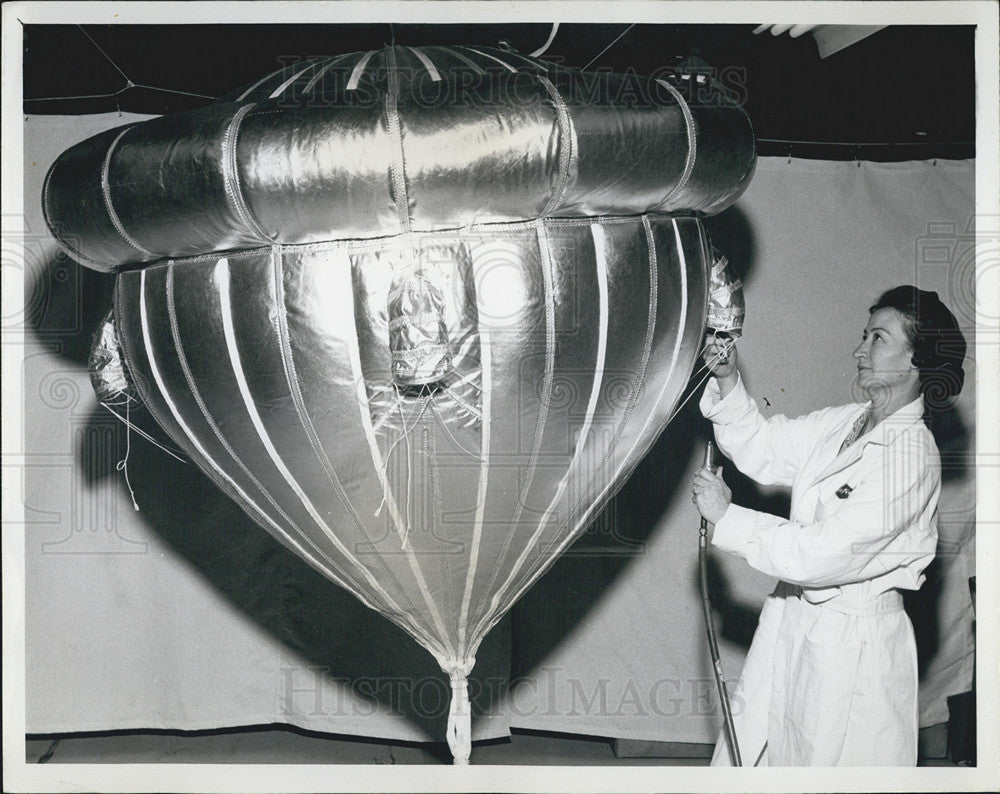 1965 Press Photo Goodyear Aerospace Corporation Technician Inflates Ballute - Historic Images