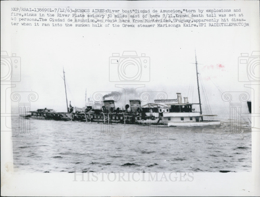 1963 Press Photo Ciudad de Asuncion Sinks Into River After Fire In river Plate - Historic Images