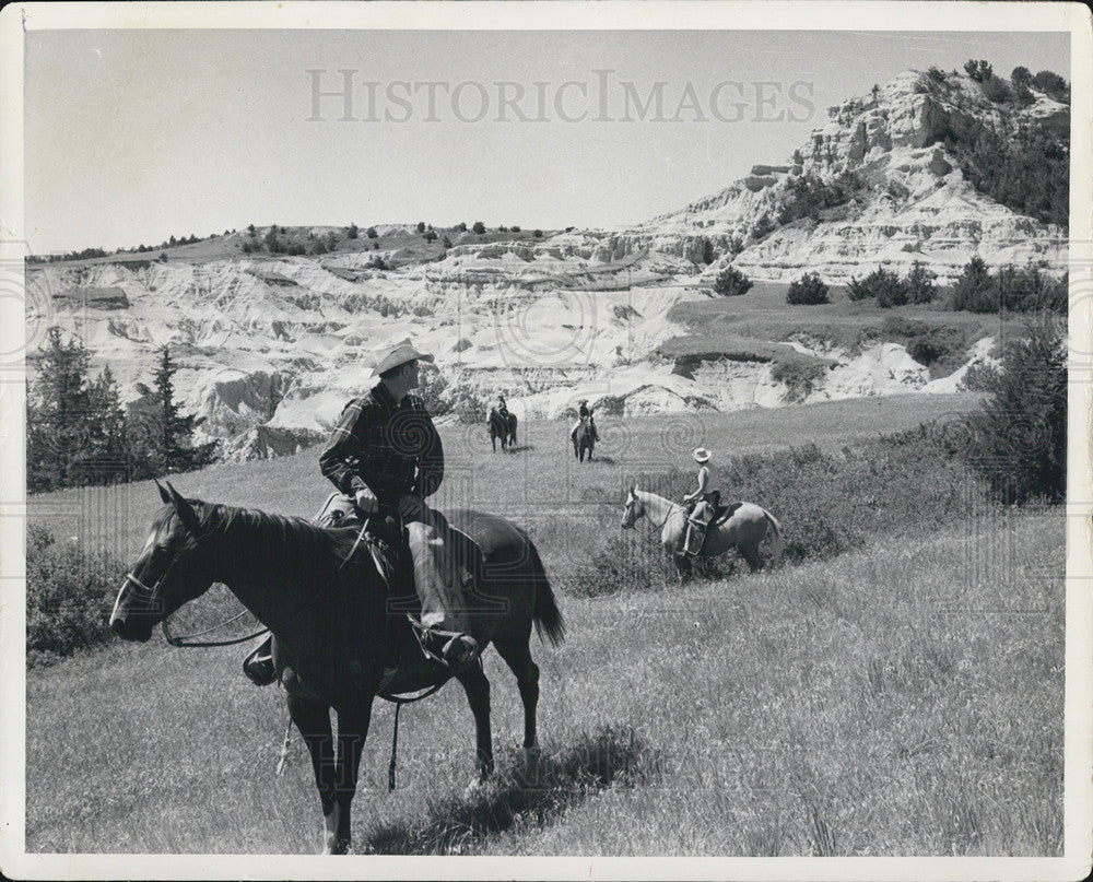 1963 Press Photo Horseback Riders In Country Of Badlands National Monument In SD - Historic Images