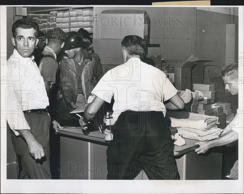 1965 Press Photo Firemen and Montgomery Ward Employees clean up after fire - Historic Images