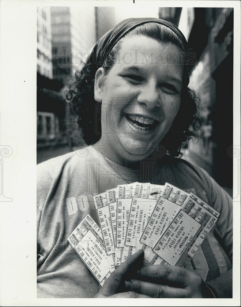 1987 Press Photo Cathy Tucker Holds Madonna Concert Tickets - Historic Images