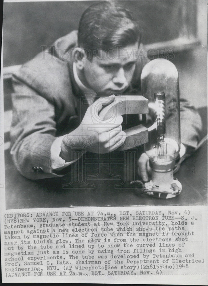 1948 Press Photo SJ Tetenbaum graduate student of New York University holds magnet - Historic Images