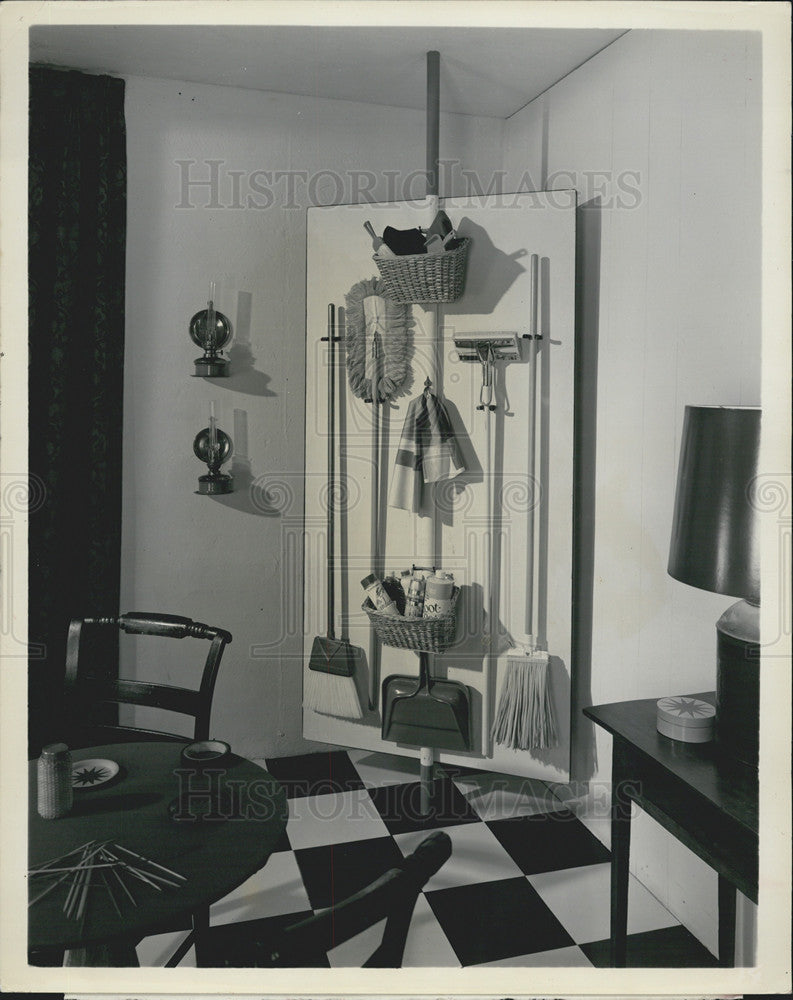 Press Photo Space saving hooks and baskets for the home - Historic Images