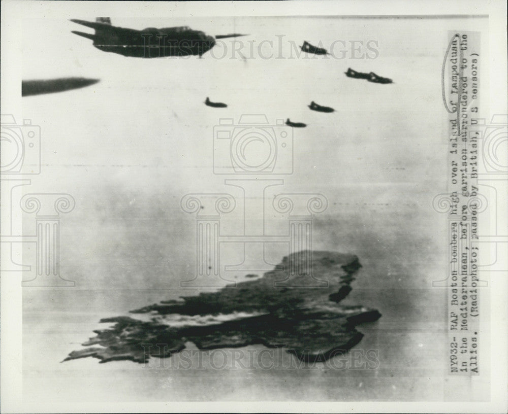 Press Photo Dropping bombs over the Island of Lampodusa - Historic Images