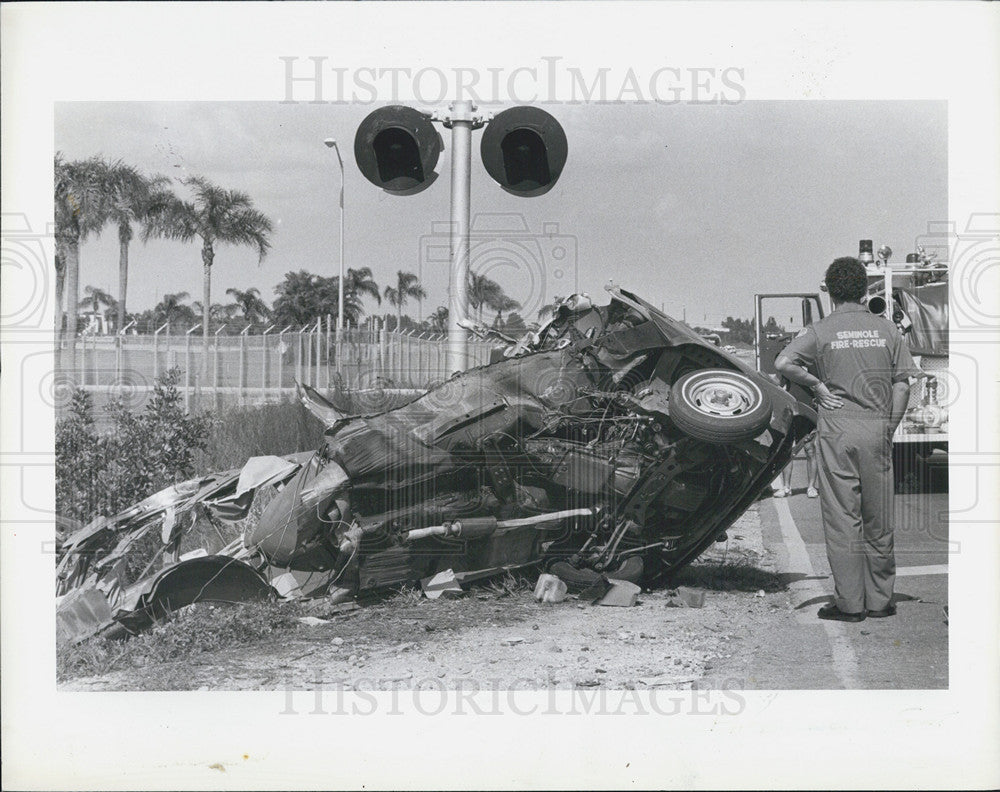 1983 Press Photo Car Collides with Amtrack Train - Historic Images