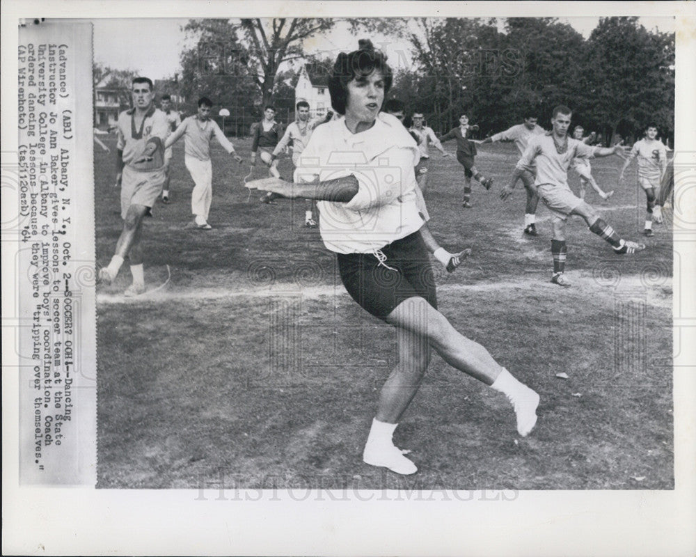 1964 Press Photo Dance Instructor JoAnn Baker Works with Soccer Team - Historic Images