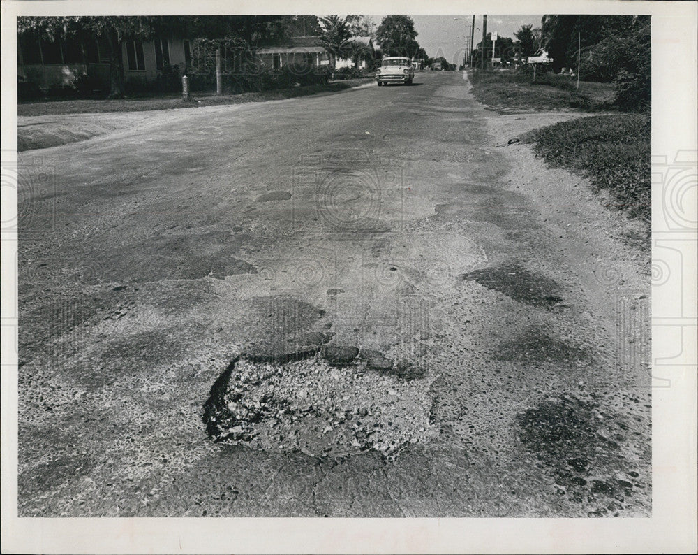 1966 Press Photo Potholes in St. Petersburg streets - Historic Images