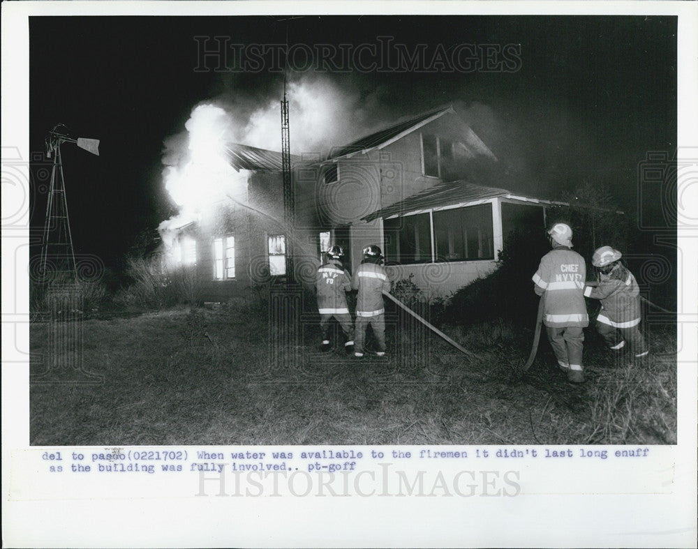 Press Photo Firemen Douse Flames With Water After Home Is Engulfed - Historic Images