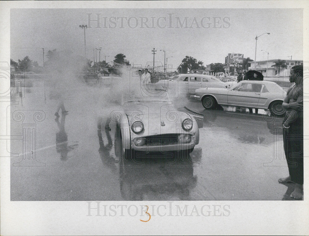 Press Photo Sports Car On Fire At Florida Auto Rally - Historic Images