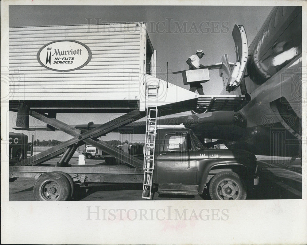 1967 Press Photo Food loaded into Eastern Airlines plane at Tampa Intl. Airport - Historic Images