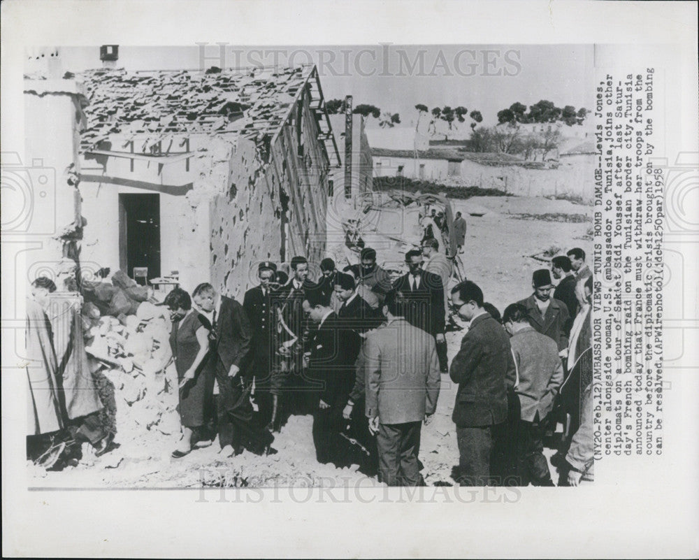 1958 Press Photo Lewis Jones Ambassador to Tunisia Surveys Bomb Damage - Historic Images