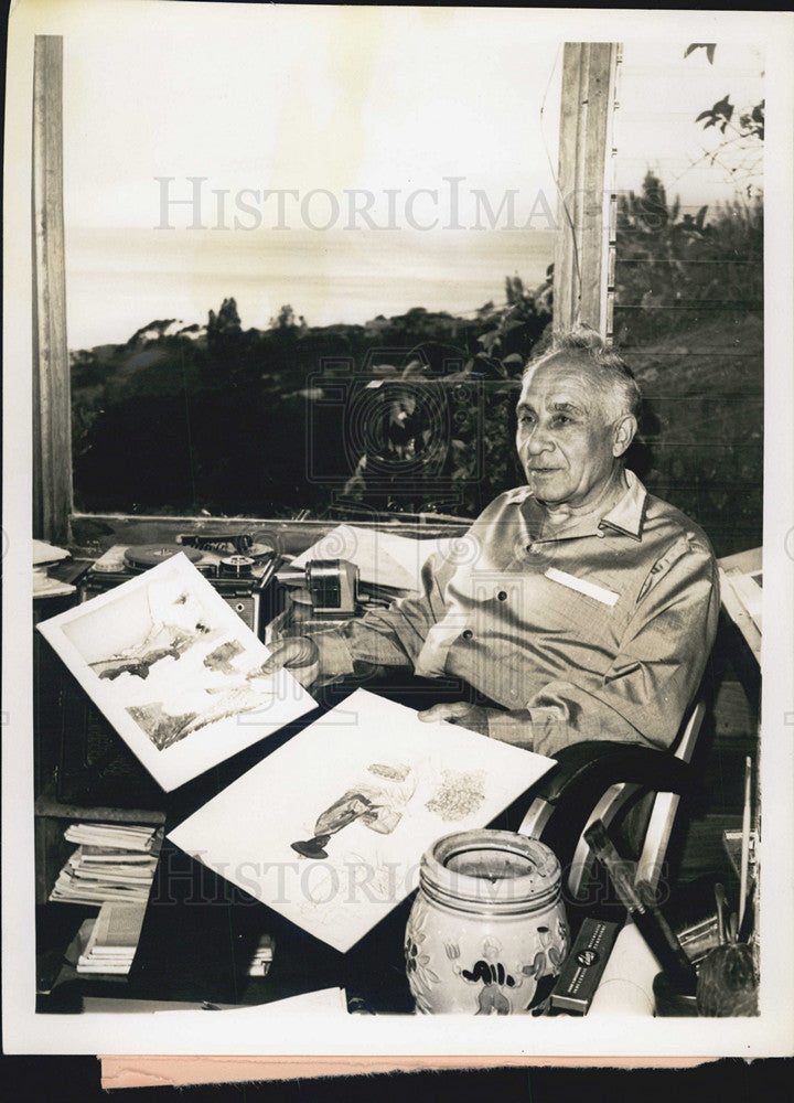 1961 Press Photo Walter Foster overlooks art work for his seven books. - Historic Images