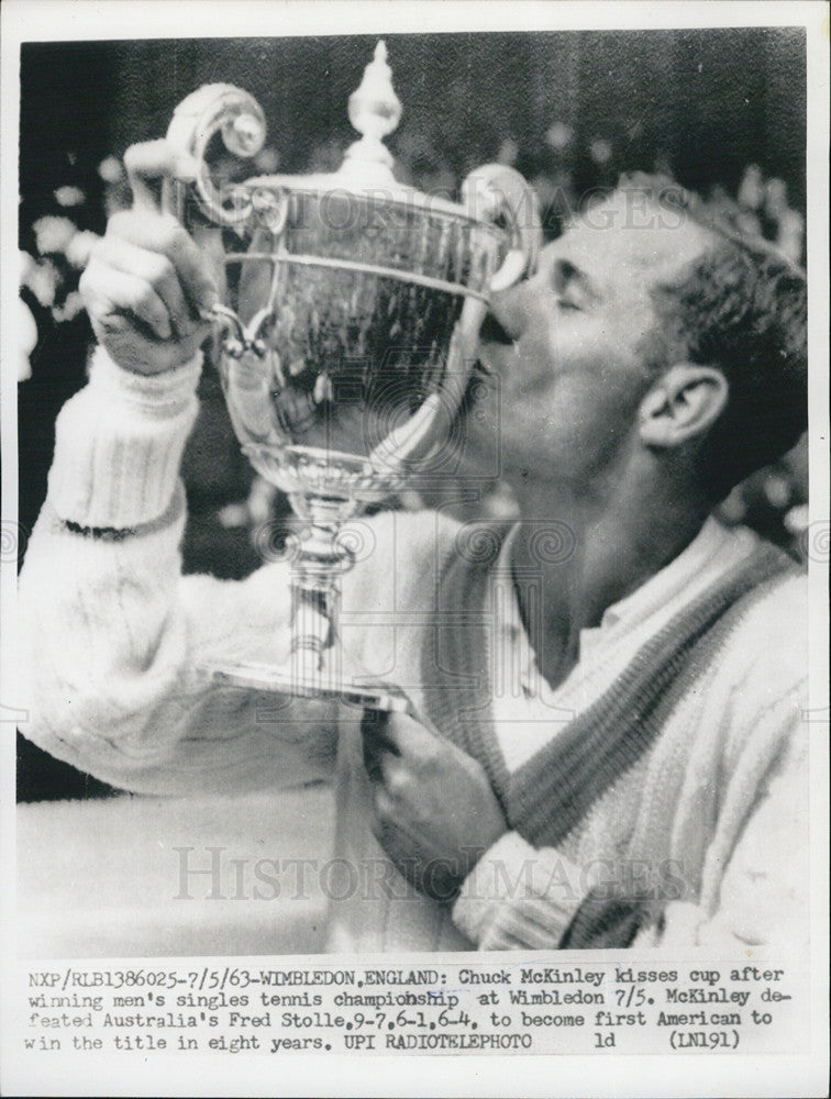 1963 Press Photo Chuck McKinley kisses cup at winning men's singles tennis - Historic Images