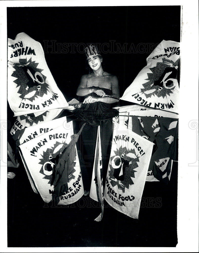 1987 Press Photo Pat Olesko waves flags &quot;War&#39;N Piece: Where Fools Russian&quot; - Historic Images