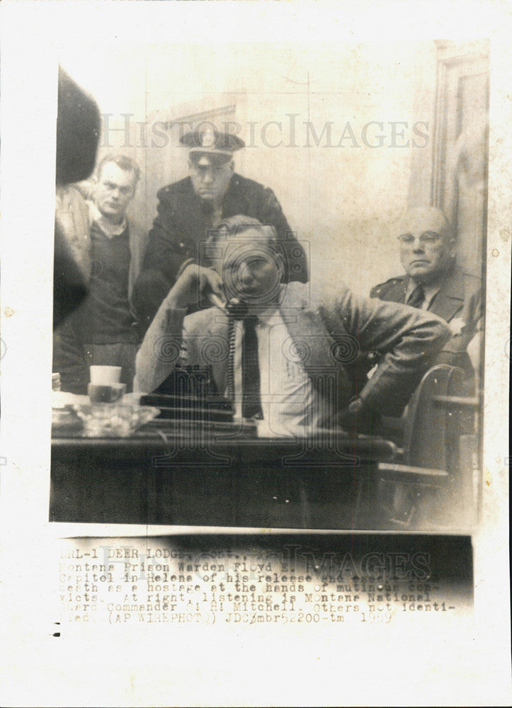 1969 Press Photo warden Floyd E. Powell Montana prison warden on the phone. - Historic Images