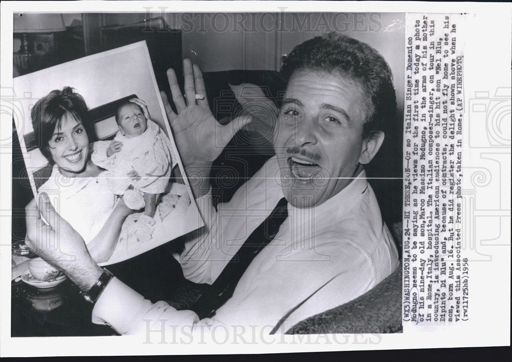 1958 Press Photo Italian Singer Domenico Modugno Sees Son&#39;s Photo - Historic Images