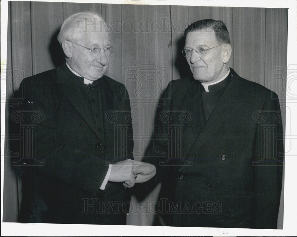 1961 Press Photo Reverend Ambrose Ondrak Shaking Hands With Man - Historic Images