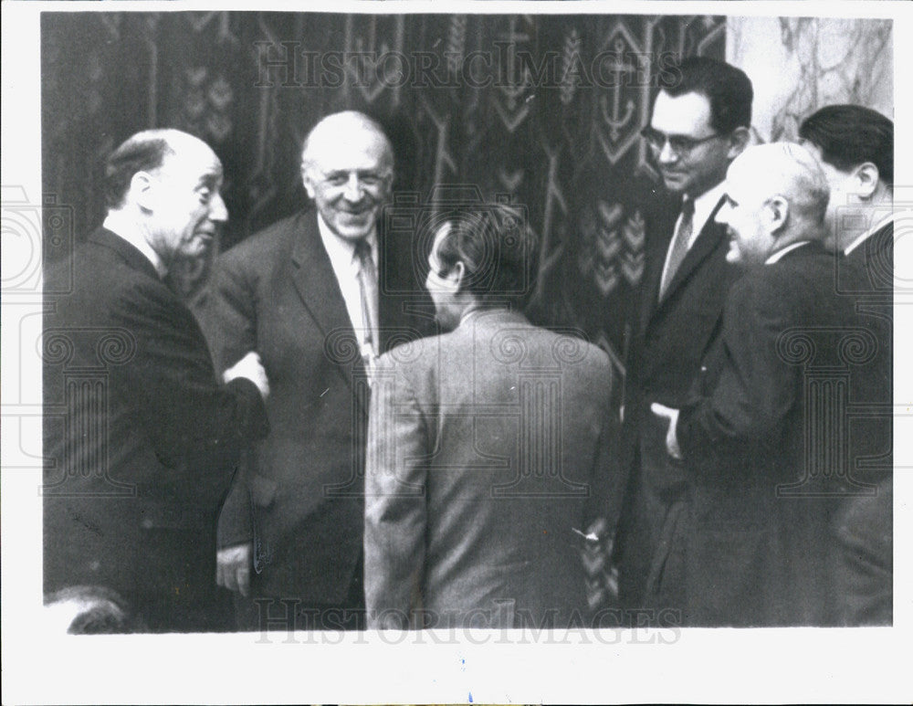 1961 Press Photo V. Zorin smiles as he listen to Adlai Stevenson at UN meeting - Historic Images