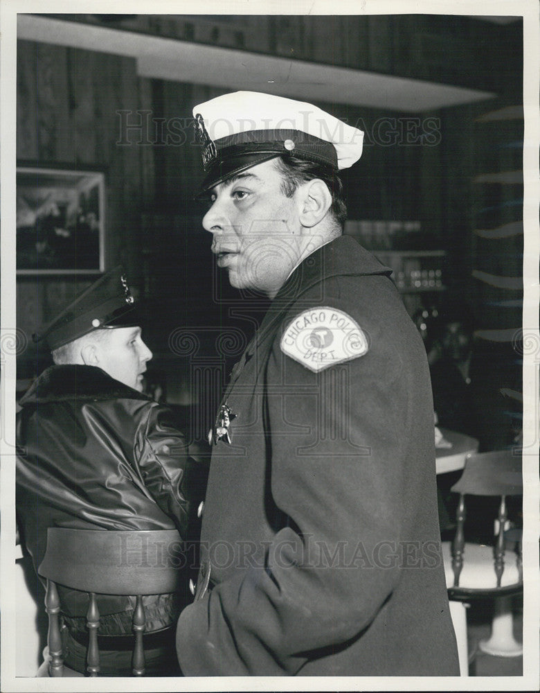 1963 Press Photo Patrol Officer Edmond Orleans lost his gun to a robber - Historic Images