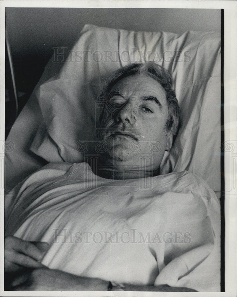 1976 Press Photo Patrolman Thomas K. Mchale beaten in his home - Historic Images