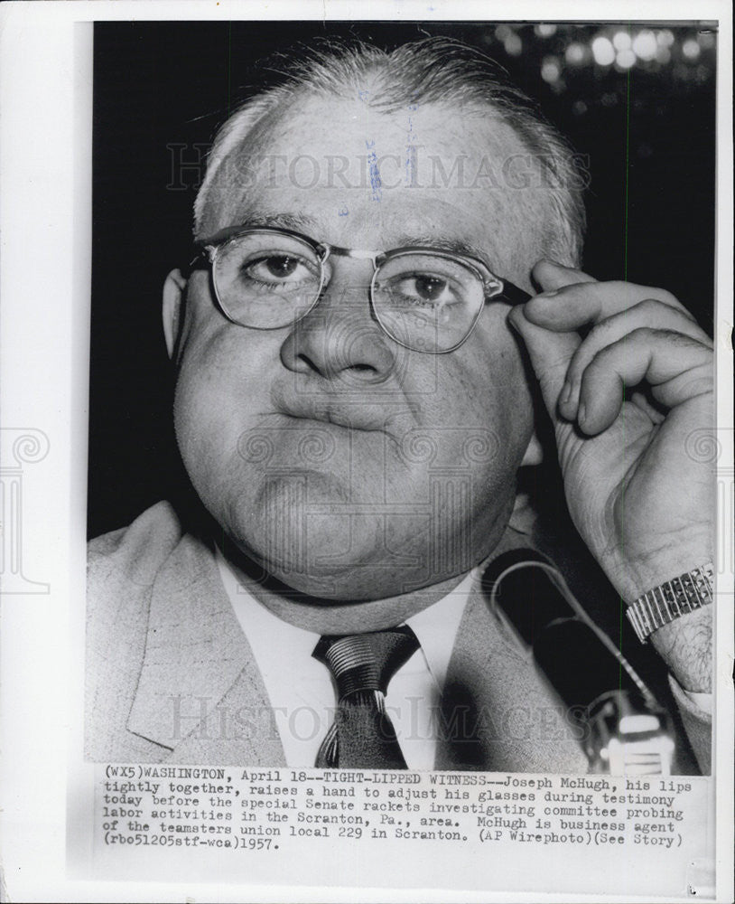 1957 Press Photo Joseph McHugh Lips tightly together. - Historic Images