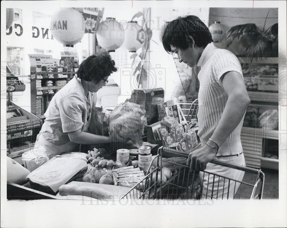 1967 Press Photo Conductor Seiji Ozawa at the market - Historic Images